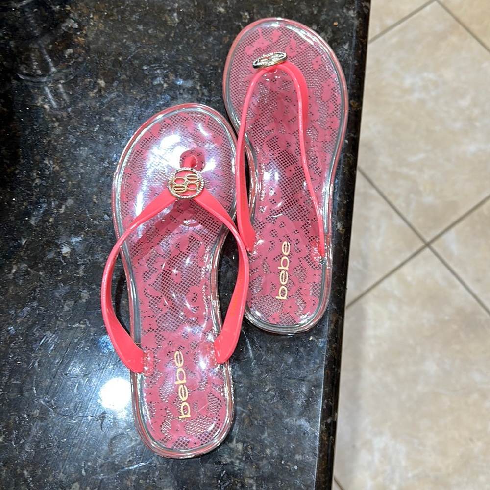 Bebe Floral, Coral Flip Flops.